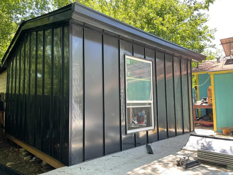 Black standing seam metal wall panels for Metal Roof Installation in Schroeppel