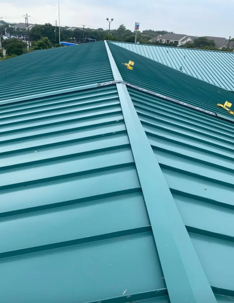 Green commercial metal roof ridge and valley for Metal Roof Repair in Schroeppel